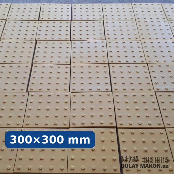 Betonli taktil plitka 300×300 mm — ogohlantiruvchi konuslar (real obyekt fotosi)