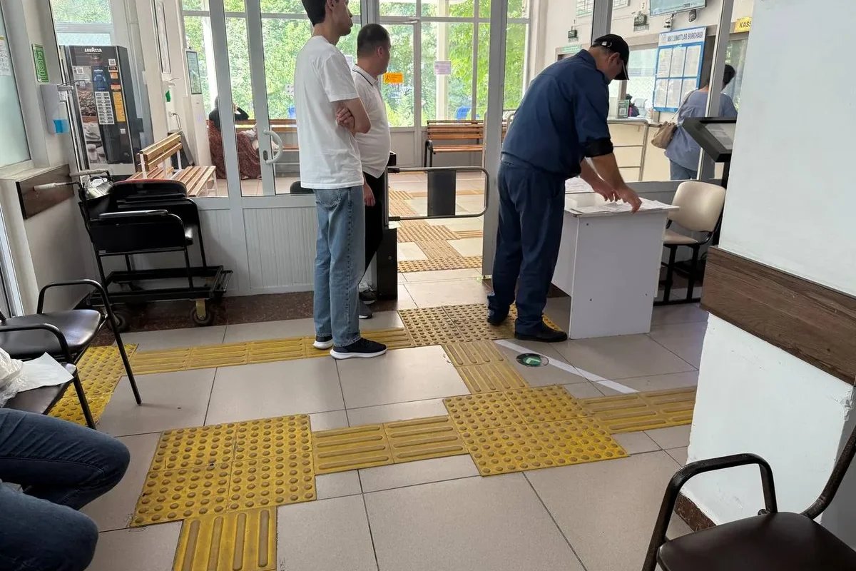 Interior · Lowered reception counter — so a wheelchair user can communicate with staff at the same level; with a tactile path.