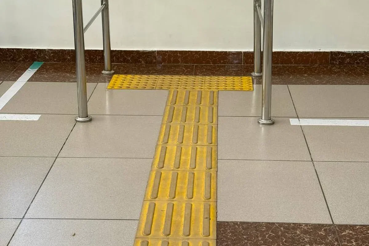 Interior · Lobby — tactile guiding tiles show the way from the entrance inside.